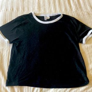 Divided H&M short sleeve tee. Black w/white hem at arms + neck. Size L. EUC